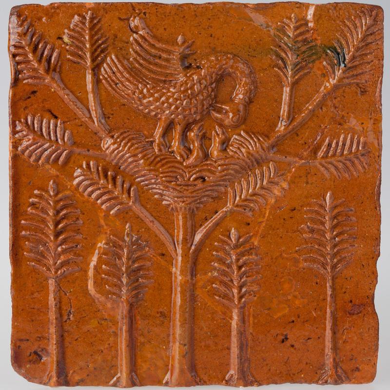 Kafel z pelikanem karmiącym pisklęta