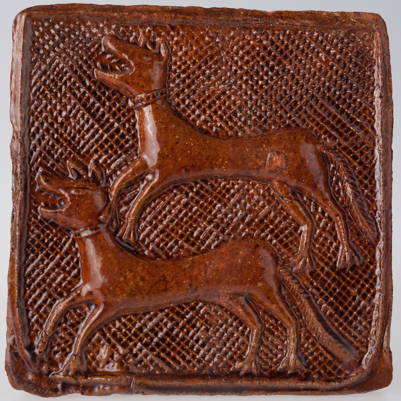 Kafel z wizerunkiem dwóch biegnących psów