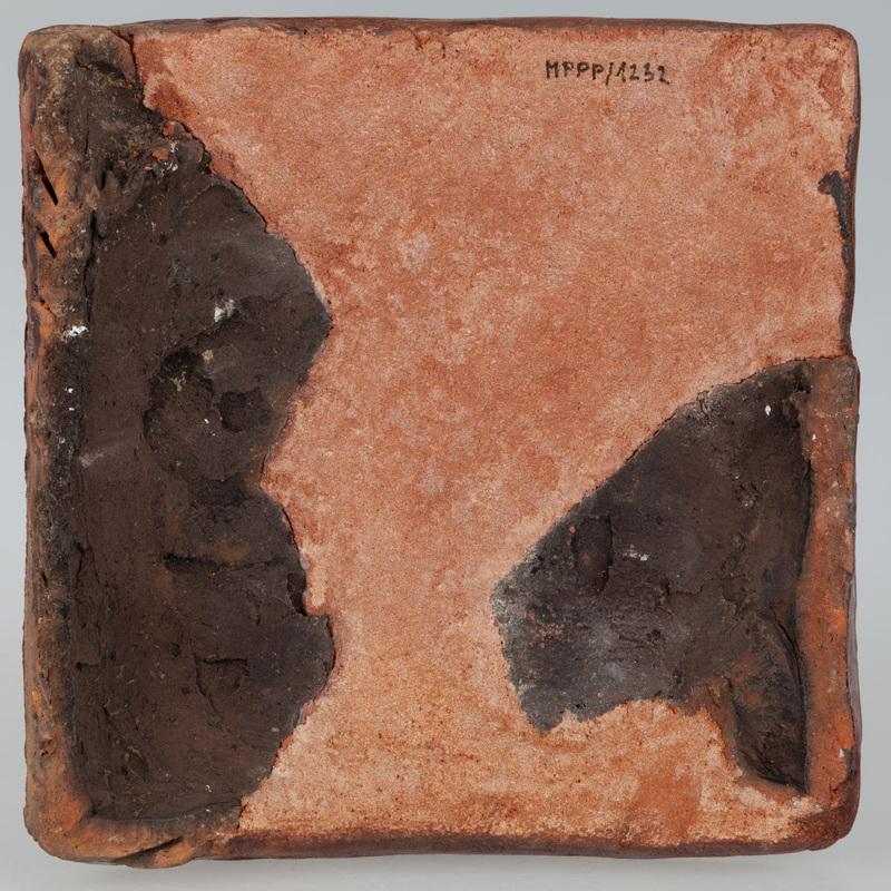 Kafel z krzyżem metropolitalnym