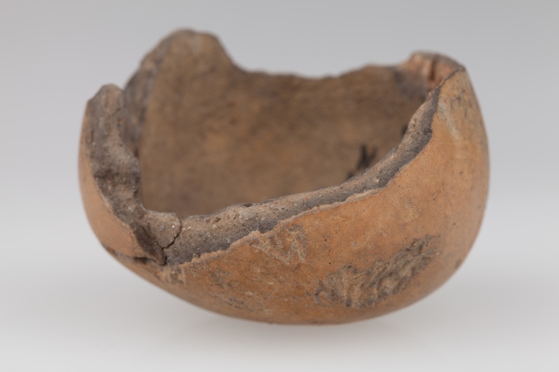 Fragment grzechotki gruszkowatego kształtu