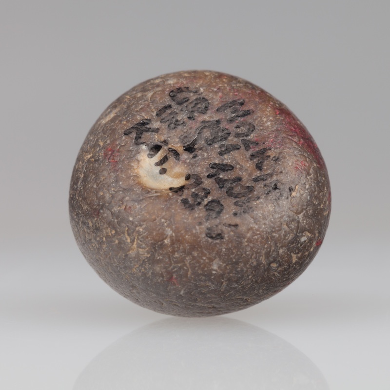 Płaskokulisty kamień do gry