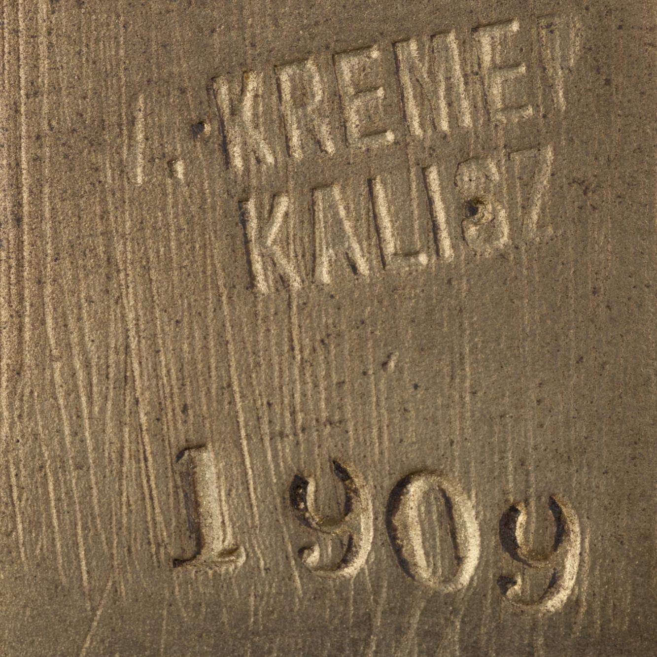 Krucyfiks mosiężny W. Kremer, Kalisz, 1909 r.