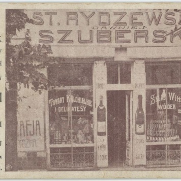 Skład win, wódek, towarów kolonjalnych i delikatesów, St. Rydzewski dawniej Szuberski w Kaliszu ul. Warszawska róg Babinej. 