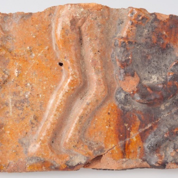 Kafel z wyobrażeniem sceny kuszenia Adama i Ewy w Raju