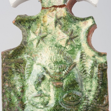 Kafel z wizerunkiem Jezusa Chrystusa i częścią w formie lilii