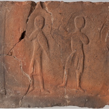 Płytka z wyobrażeniem wojowników