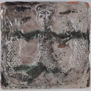 Kafel z wyobrażeniem syreny z dwoma ogonami