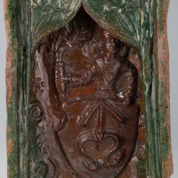 Kafel z tarczownikiem z herbem Odrowąż w tarczy