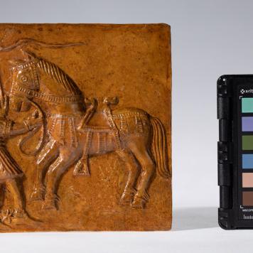 Kafel z motywem człowieka i konia